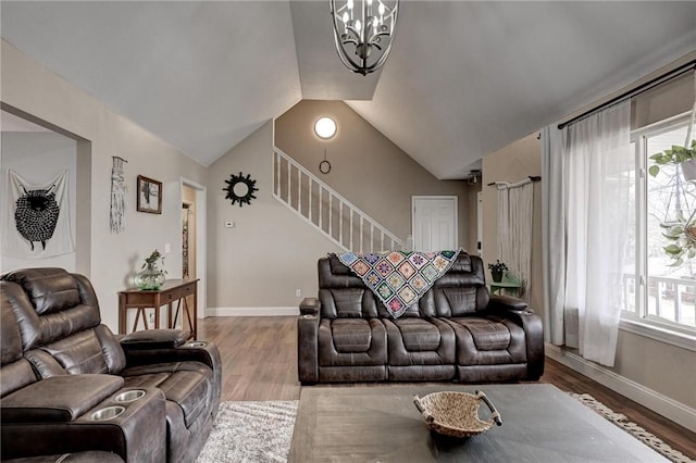 1801 Cash St, Neosho, MO 64850 - living area with a wealth of natural light, stairway, a notable chandelier, and baseboards