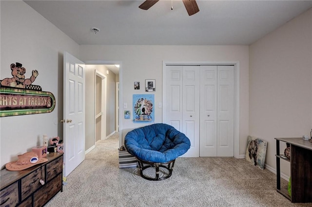 1801 Cash St, Neosho, MO 64850 - living area featuring ceiling fan, baseboards, and carpet floors