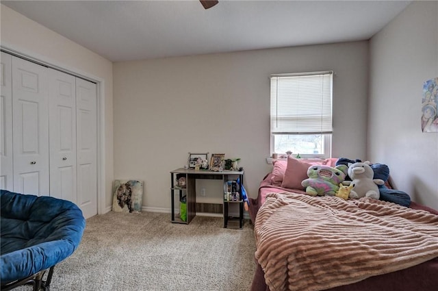 1801 Cash St, Neosho, MO 64850 - carpeted bedroom featuring a closet, baseboards, and a ceiling fan