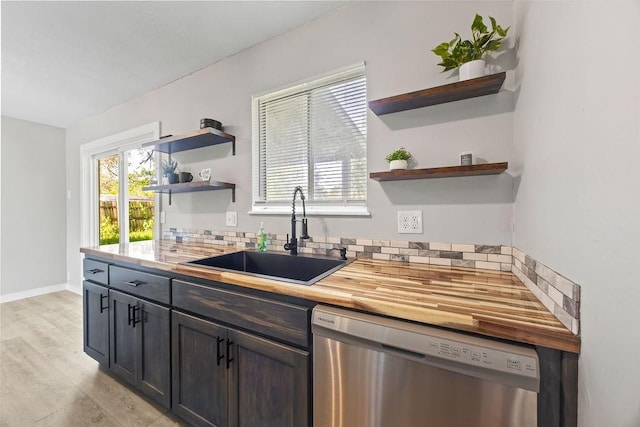 1004 N 30th St, Rogers, AR 72756 - kitchen featuring open shelves, dishwasher, a sink, and wood counters