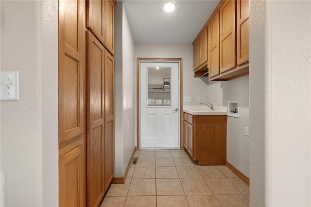 1120 County Road 6012, Berryville, AR 72616 - interior space featuring light tile patterned floors, a sink, baseboards, and visible vents