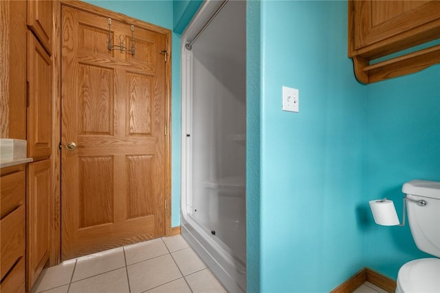 1120 County Road 6012, Berryville, AR 72616 - full bathroom featuring tile patterned flooring, toilet, and baseboards