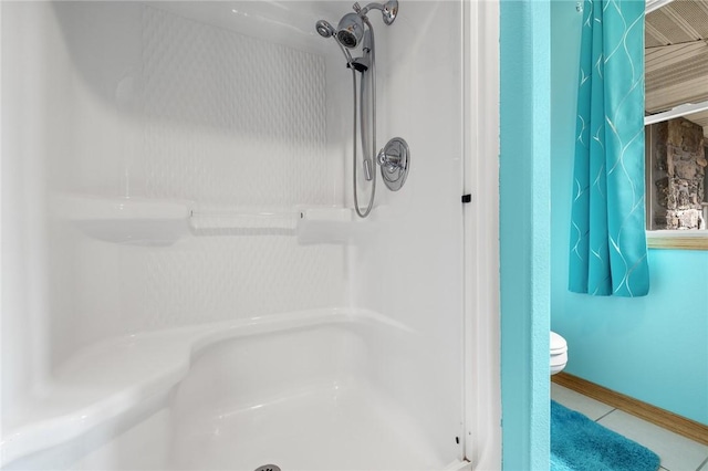 1120 County Road 6012, Berryville, AR 72616 - bathroom with toilet, tile patterned floors, baseboards, and walk in shower