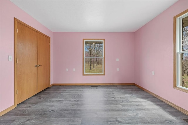 1120 County Road 6012, Berryville, AR 72616 - spare room with baseboards and wood finished floors