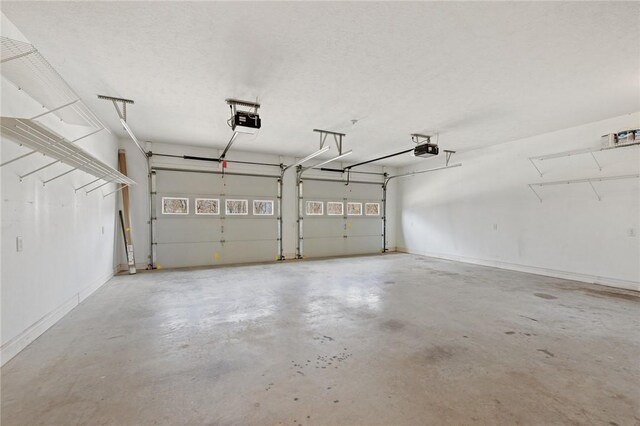 1120 County Road 6012, Berryville, AR 72616 - garage featuring a garage door opener