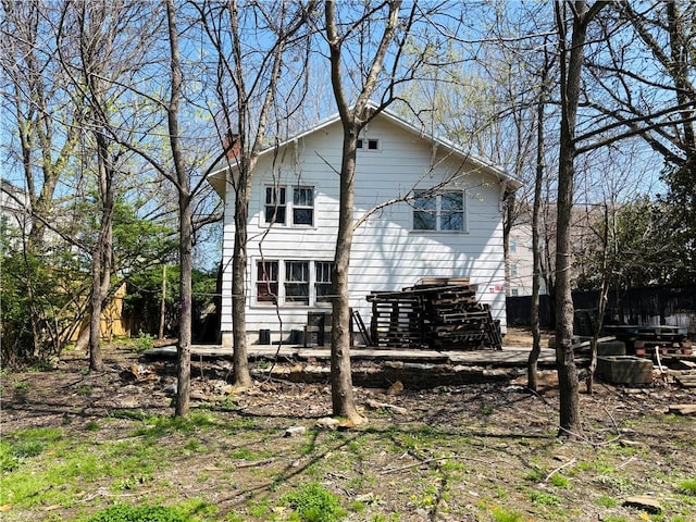 887 S Lt Col Leroy Pond Ave, Fayetteville, AR 72701 - back of house with a chimney