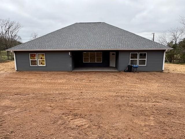 210 Rose Hill Dr, Berryville, AR 72616 - rear view of property with roof with shingles