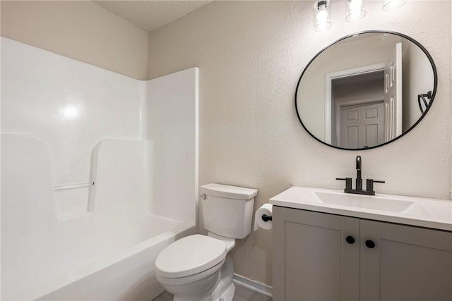 4292 W Beaver Ln, Fayetteville, AR 72704 - bathroom with toilet, vanity, baseboards, and bathing tub / shower combination