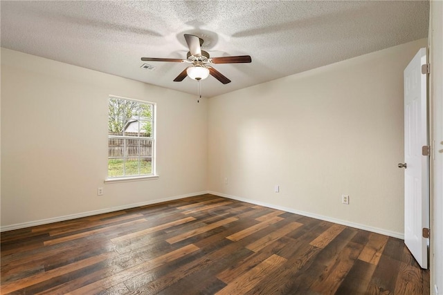 4292 W Beaver Ln, Fayetteville, AR 72704 - spare room featuring ceiling fan, dark wood-type flooring, baseboards, and a textured ceiling