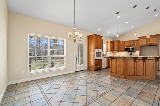11992 Cripps Rd, Gentry, AR 72734 - kitchen featuring a healthy amount of sunlight, white appliances, a breakfast bar area, and a chandelier