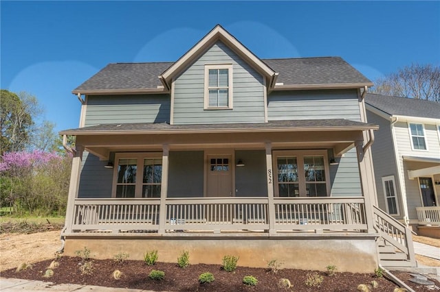 852 S Waxflower Ave, Fayetteville, AR 72701 - view of front of home featuring covered porch and a shingled roof