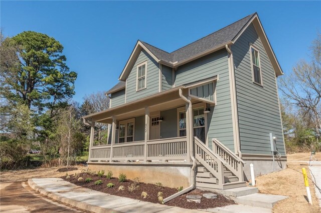 852 S Waxflower Ave, Fayetteville, AR 72701 - view of front of property with a porch