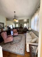 805 N Front St, Dardanelle, AR 72834 - living room featuring wood finished floors