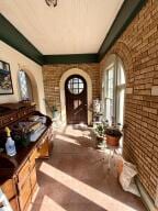 805 N Front St, Dardanelle, AR 72834 - interior space with brick wall and arched walkways