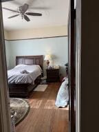 805 N Front St, Dardanelle, AR 72834 - bedroom with ceiling fan and wood finished floors