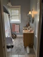 805 N Front St, Dardanelle, AR 72834 - bathroom featuring vanity, baseboards, and tile patterned floors