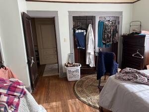 805 N Front St, Dardanelle, AR 72834 - bedroom featuring wood finished floors