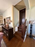 805 N Front St, Dardanelle, AR 72834 - stairway featuring wood finished floors