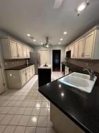 604 S Seattle Ave, Russellville, AR 72801 - kitchen featuring light tile patterned floors and recessed lighting