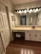 604 S Seattle Ave, Russellville, AR 72801 - bathroom featuring wallpapered walls and vanity