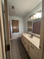 604 S Seattle Ave, Russellville, AR 72801 - bathroom featuring toilet, visible vents, and vanity