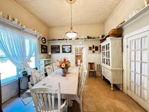dining room featuring tile patterned flooring