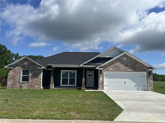 116 Mountain View Dr, Dardanelle, AR 72834 - view of front facade featuring brick siding, an attached garage, concrete driveway, and a front yard