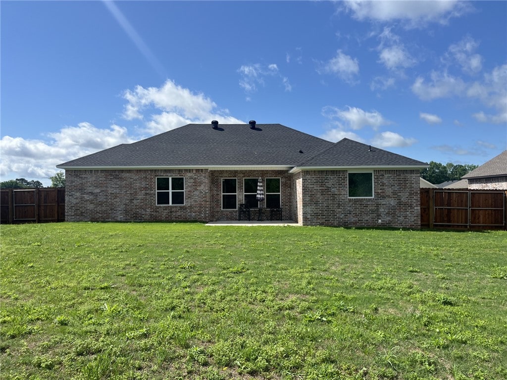 116 Mountain View Dr, Dardanelle, AR 72834 - back of house featuring brick siding, a patio area, and roof with shingles