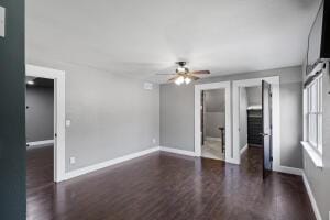 1053 Tucker Mountain Rd, Dover, AR 72837 - unfurnished room with wood finished floors, ceiling fan, and baseboards