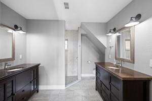 1053 Tucker Mountain Rd, Dover, AR 72837 - bathroom featuring two vanities, visible vents, and a sink
