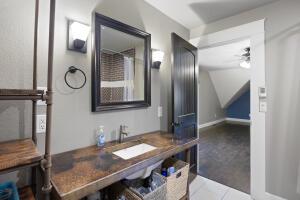 1053 Tucker Mountain Rd, Dover, AR 72837 - bathroom with ceiling fan and vanity