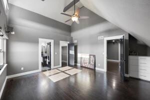 1053 Tucker Mountain Rd, Dover, AR 72837 - interior space featuring wood finished floors, baseboards, a ceiling fan, and vaulted ceiling