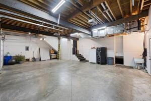 1053 Tucker Mountain Rd, Dover, AR 72837 - unfinished basement featuring washer / clothes dryer