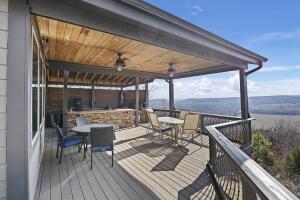 1053 Tucker Mountain Rd, Dover, AR 72837 - wooden terrace featuring outdoor dining space