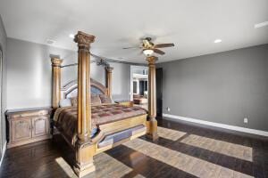 1053 Tucker Mountain Rd, Dover, AR 72837 - bedroom with ornate columns, wood finished floors, and baseboards