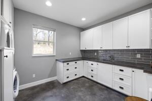 1053 Tucker Mountain Rd, Dover, AR 72837 - laundry room featuring laundry area, baseboards, and recessed lighting