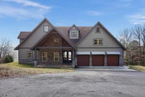 1053 Tucker Mountain Rd, Dover, AR 72837 - view of front of home with an attached garage and driveway