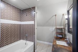 1053 Tucker Mountain Rd, Dover, AR 72837 - full bath with vanity, baseboards, and tile patterned flooring