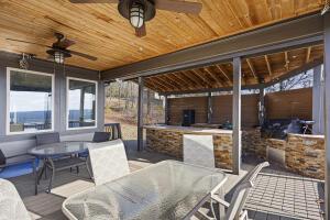 1053 Tucker Mountain Rd, Dover, AR 72837 - view of patio with outdoor dining space and ceiling fan