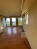 11307 Lakeridge Rd, Dardanelle, AR 72834 - corridor featuring wood finished floors