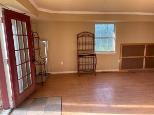 11307 Lakeridge Rd, Dardanelle, AR 72834 - unfurnished room with baseboards and wood finished floors