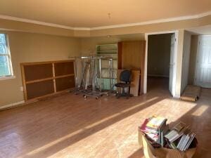 11307 Lakeridge Rd, Dardanelle, AR 72834 - unfurnished living room with baseboards and wood finished floors