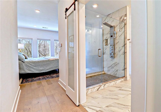 203 S W Ave Unit 1, Fayetteville, AR 72701 - bathroom featuring ensuite bath, a stall shower, baseboards, and recessed lighting