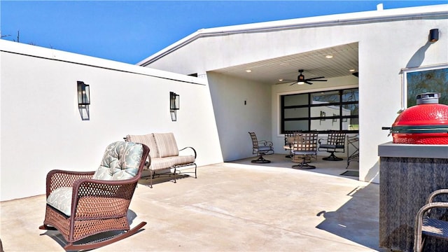 203 S W Ave Unit 1, Fayetteville, AR 72701 - view of patio / terrace featuring a ceiling fan