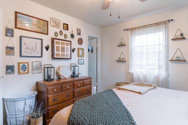 bedroom featuring ceiling fan