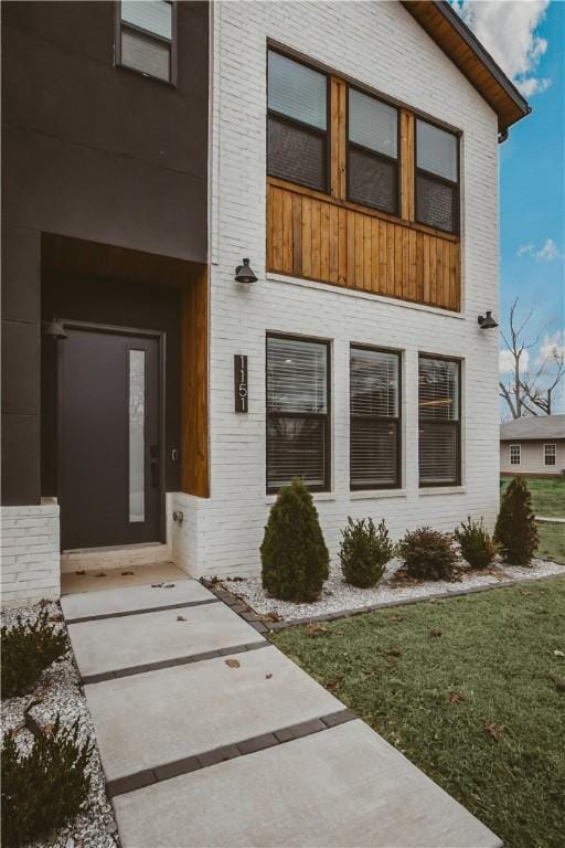 1151 NE Monroe St, Bentonville, AR 72712 - entrance to property featuring brick siding
