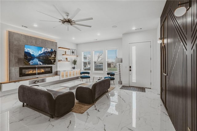 1151 NE Monroe St, Bentonville, AR 72712 - living area featuring recessed lighting, light marble finish flooring, and ceiling fan