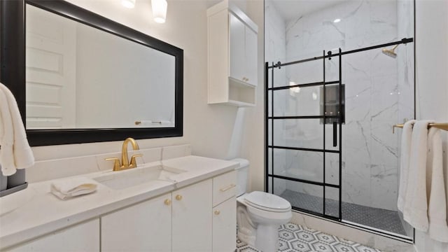 225 SE 7th St, Bentonville, AR 72712 - bathroom featuring a marble finish shower, vanity, toilet, and tile patterned flooring