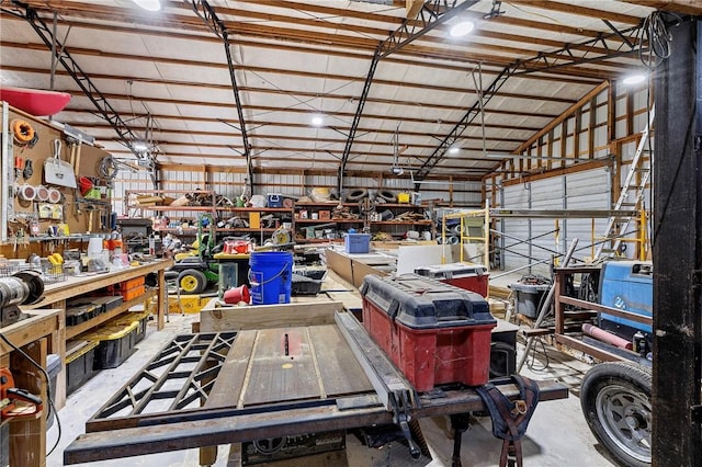 garage with a workshop area and metal wall