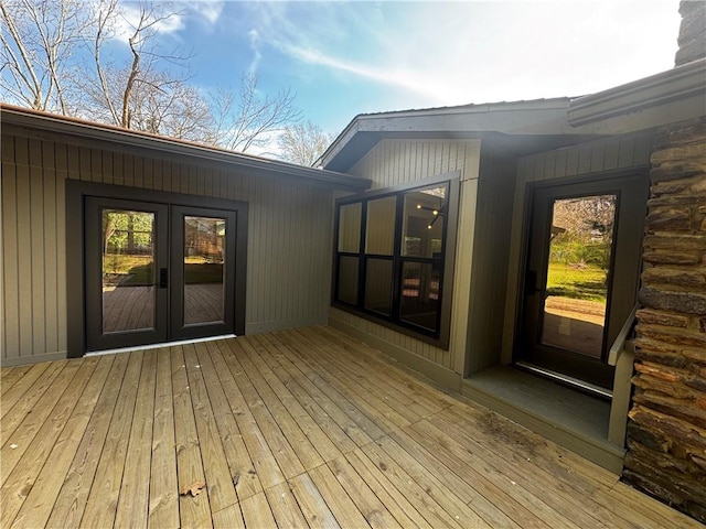 wooden terrace featuring french doors